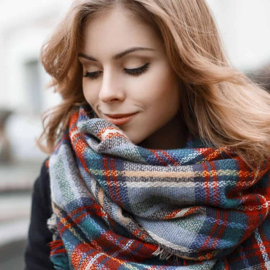 How to Wear a Blanket Scarf The Perfect Travel Accessory She Packs Lite